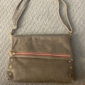 Pewter leather VIP Lrg crossbody clutch from Hammitt, Grey with red zip and gold